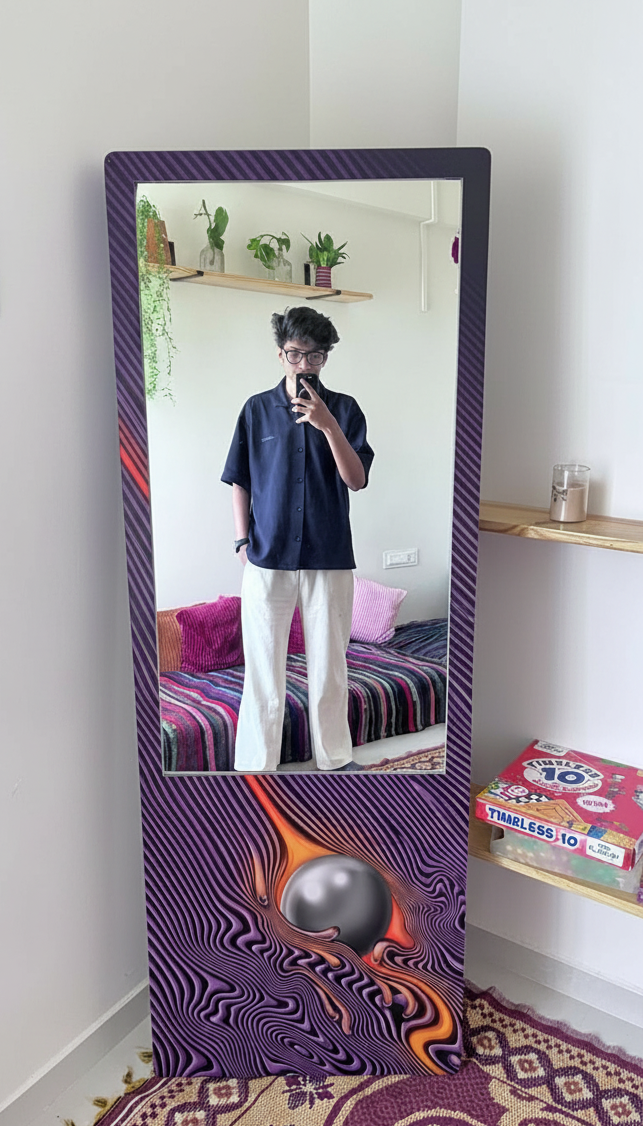Person taking a mirror selfie in a room with a decorative mirror and colorful rug.